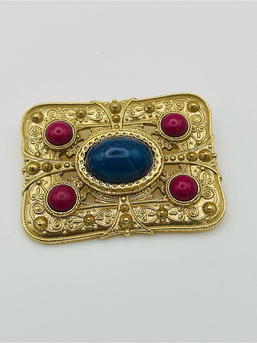 Gold-Tone Rectangle Filigree Brooch with Blue Cabochon and Pink Accents